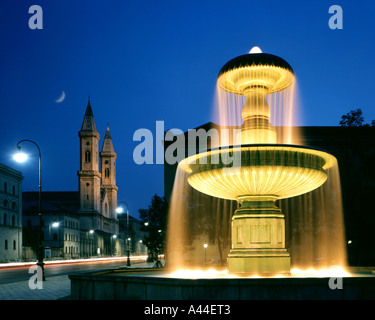 DE - BAVARIA: Church of St. Ludwig and University Fountain in Munich Stock Photo