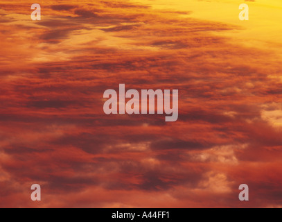 dh Sunrise Clouds only SKY WEATHER Cloudspace flaming sky early morning cloud patterns dawn red orange sun rise Stock Photo