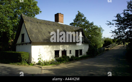 Sixteenth century Bridge Cottage Flatford beside river Stour painted by John Constable near East Bergholt Suffolk Essex border Stock Photo