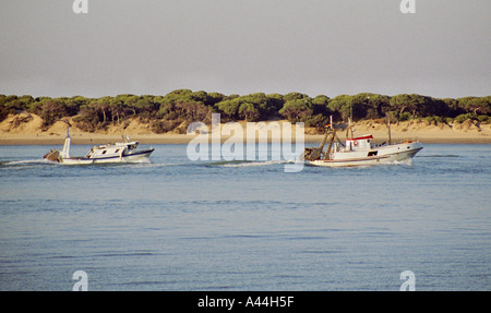 Boats on the Guadalquivir Estuary Donana National Park close to Sanlucar de Barrameda Andalusia Spain Stock Photo