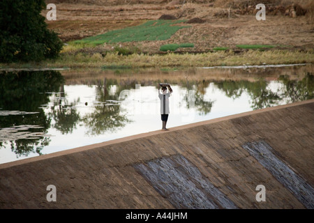 Small boy working in the fields near Sanga village,Dogon Country, Mali, West Africa Stock Photo