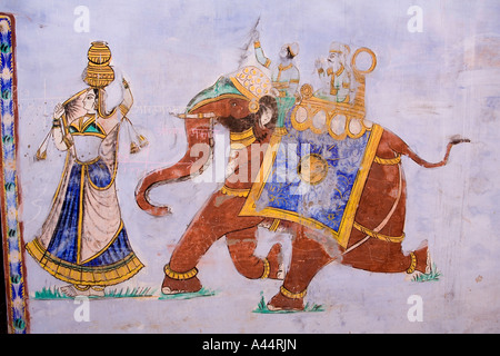 India Rajasthan Bundi traditionally painted elephant scene on side of house Stock Photo