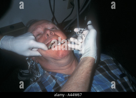 Dentist Giving Pain Killing Shot Stock Photo