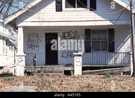 House with gang graffiti Photographed in Kansas City MO USA ESL stands for East Side Locos a Hispanic gang Stock Photo