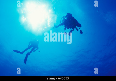 Teenage boy scuba diving in mid water Luke Hanna MR Stock Photo