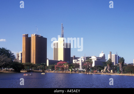 Nairobi city skyline seen from the boating lake in Uhuru Park Kenya East Africa Stock Photo