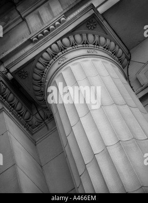 Low angle of stone Corinthian pillar. Stock Photo