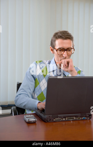 Office worker using laptop computer Stock Photo