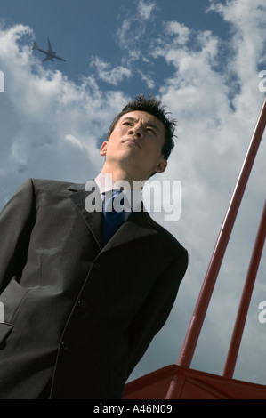 Businessman and cloudy sky Stock Photo