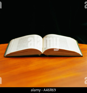 Open book on table Stock Photo