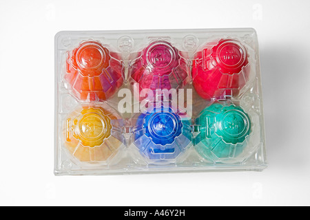 Colored eggs in clear box, easter eggs, cut-out Stock Photo