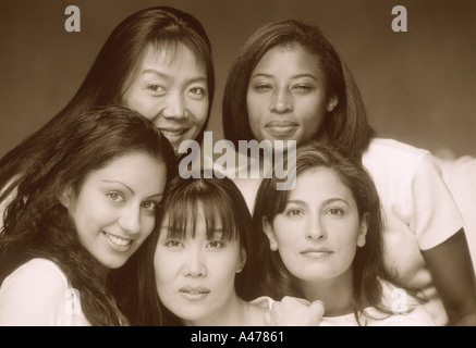 Five beautiful women and four different races Stock Photo