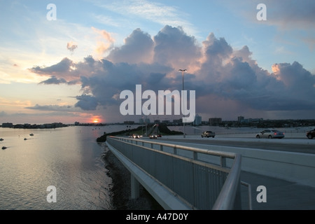 Sunset on Clearwater Beach, Florida with the Memorial Causeway Bridge in the Foreground Stock Photo