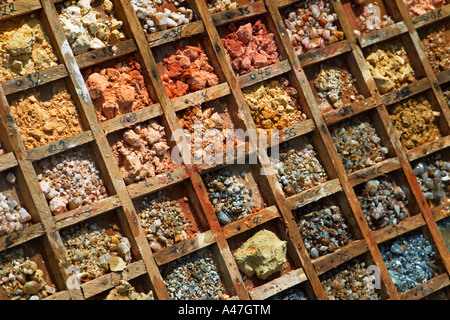 Drill chip samples during exploration drilling showing multi colored rock types, gold mine, Ghana, W Africa Stock Photo