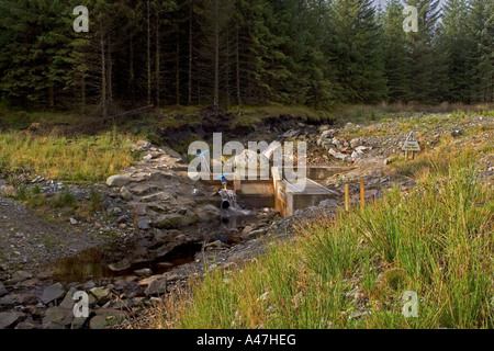 Weir of small scale hydro electric power scheme, Scotland UK Stock Photo