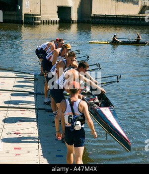 Crew putting scull in water at Milwaukee River Challenge Milwaukee Wisconsin USA Stock Photo