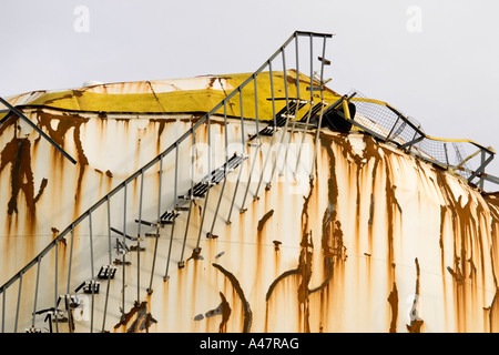 Stairway on damaged oil tank, Buncefield depot, Hemel Hempstead, Hertfordshire, UK Stock Photo