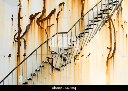 Stairway on damaged oil tank, Buncefield depot, Hemel Hempstead, Hertfordshire, UK Stock Photo