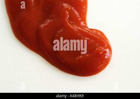 Dollop of tomato ketchup on white background Stock Photo