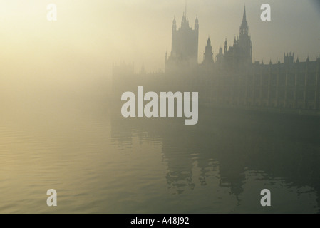 the houses of parliament with mist over the thames Stock Photo