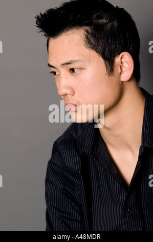 Young man contemplating, portrait Stock Photo