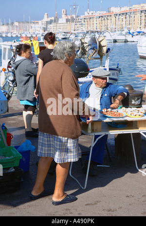 View of animated characteristic traditional fish market Vieux Old Port Marseille Provence Southern France Europe Stock Photo