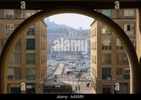 Panoramic view of seafront & Vieux Port through a archway Marseille Old Provence Southern France Europe Stock Photo