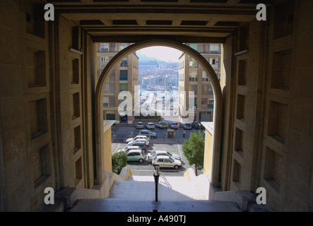 Panoramic view of seafront & Vieux Port through a archway Marseille Old Provence Southern France Europe Stock Photo
