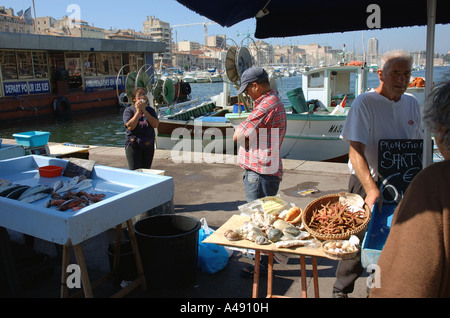 View of animated characteristic traditional fish market Vieux Old Port Marseille Provence Southern France Europe Stock Photo