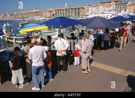 View of animated characteristic traditional fish market Vieux Old Port Marseille Provence Southern France Europe Stock Photo