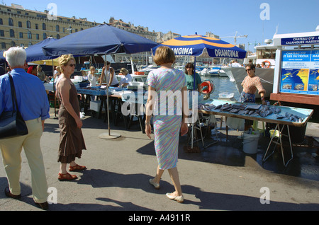 View of animated characteristic traditional fish market Vieux Old Port Marseille Provence Southern France Europe Stock Photo