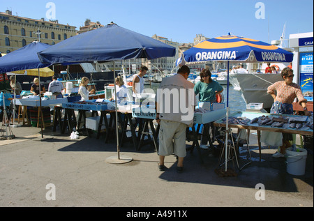 View of animated characteristic traditional fish market Vieux Old Port Marseille Provence Southern France Europe Stock Photo