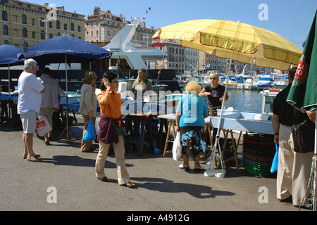 View of animated characteristic traditional fish market Vieux Old Port Marseille Provence Southern France Europe Stock Photo