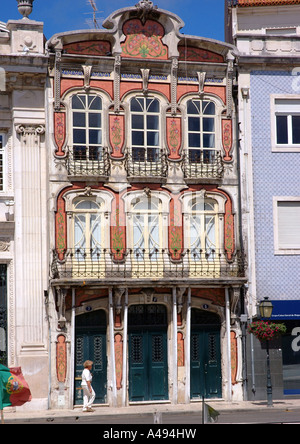 View magnificent pink building in old town centre street Aveiro Iberia Iberian Peninsula North Northern Portugal Europe Stock Photo