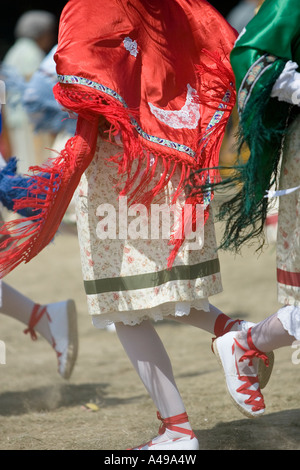 Colourful traditional costume of Basque women performing folk dances fiesta Andra Mari de Gorliz Basque Country Spain Stock Photo