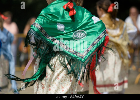 Colourful traditional green shawl of Basque woman performing folk dance fiesta Andra Mari de Gorliz Basque Country Spain Stock Photo