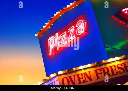 Neon pizza signs on midway at State Fair of Texas Stock Photo