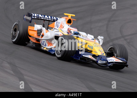 Heikki Kovalainen FIN in his Renault R27 racecar at the track on Circuit de Catalunya near Barcelona Stock Photo