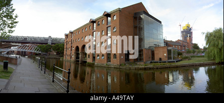 Panoramic view of Merchants Warehouse on the Bridgewater Canal, Castlefield Basin, Manchester, UK Stock Photo