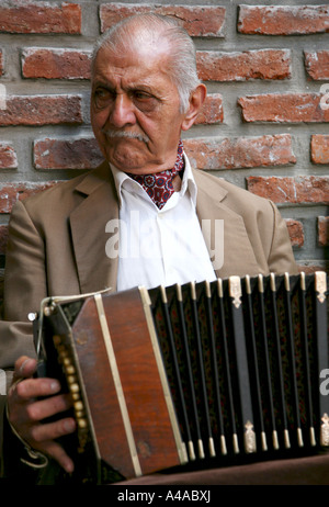 old argentine man playing accordion buenos aires Stock Photo