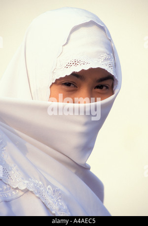 Young Javanese girl in traditional muslim dress Yogyakarta Java Indonesia Southeast Asia Stock Photo