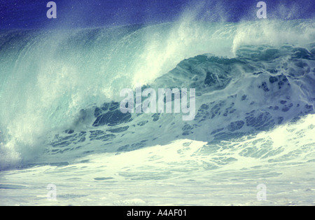 Large wave breaking at Pipeline on the island of Oahu Hawaii USA Stock Photo