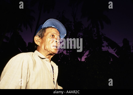 Tating Pedro, a farmer, has lived on the Imok plantation in the Philippines since the age of 7. He is being thrown off the land Stock Photo
