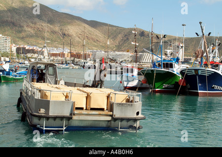 Los Cristianos harbour and port southern Tenerife Canary Islands Spain seawater fish tanks being transported to market Stock Photo