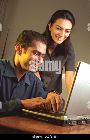 Executives working on a laptop Stock Photo