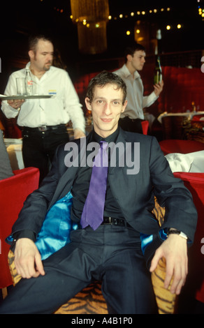 Actor Martin Hancock smoking a large cigar in The Reform restaurant in Manchester Stock Photo