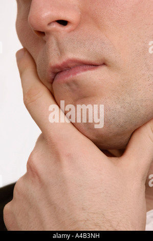 Thoughtful young man Stock Photo