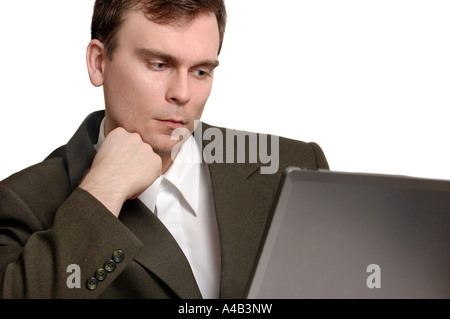 Young businessman working on a laptop Stock Photo