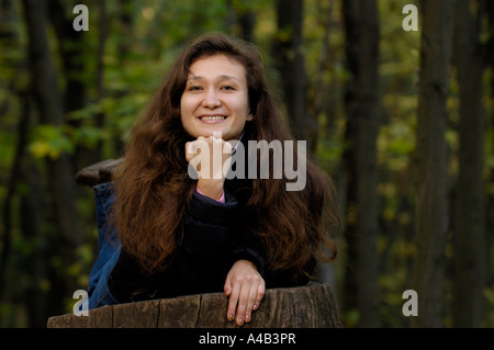 Young romantic woman in a forest Stock Photo