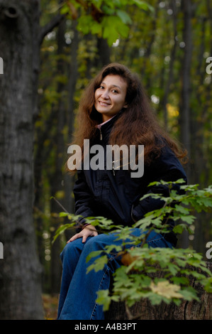 Young romantic woman in a forest Stock Photo